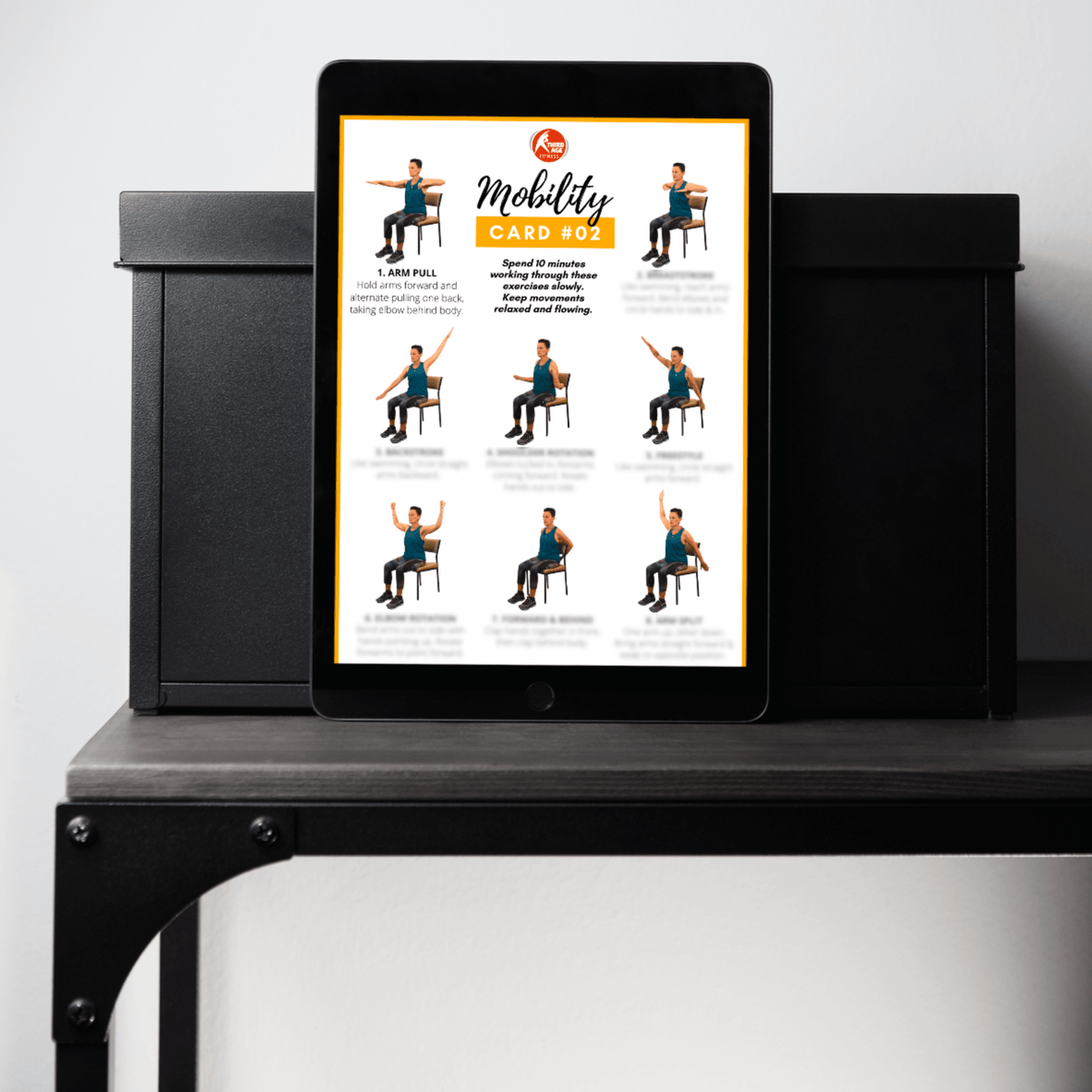 Tablet displaying mobility exercises on a black stand with a white background
